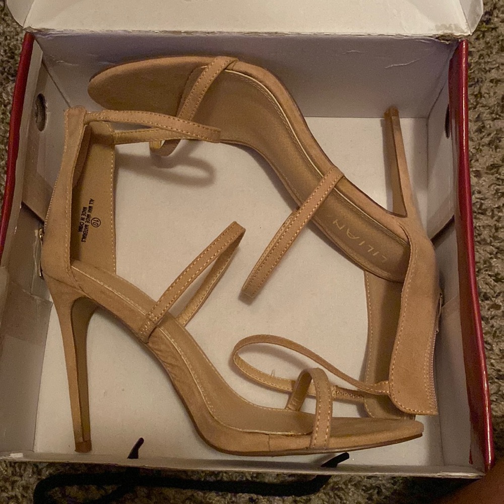 Tan high heeled sandals